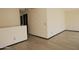 Open loft space featuring wood-look vinyl flooring and fresh neutral paint at 43241 W Kristal Ln, Maricopa, AZ 85138