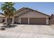 Charming single-story home featuring a two-car garage, desert landscaping, and a well-maintained front yard at 441 E Pinto Dr, Gilbert, AZ 85296