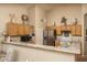 Functional kitchen with granite countertops, stainless steel appliances, and ample cabinet space at 441 E Pinto Dr, Gilbert, AZ 85296