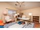 Inviting office space with desk, chair, shelving, and bright natural light at 441 E Pinto Dr, Gilbert, AZ 85296