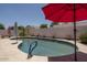 Inviting backyard pool area, perfect for relaxation and entertainment, with ample space for outdoor furniture at 441 E Pinto Dr, Gilbert, AZ 85296