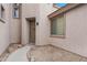 The house's front entrance features desert landscaping with a walkway leading to the front door at 44348 W Windrose Dr, Maricopa, AZ 85138