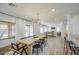 Open floorplan with dining area that flows into the living room and kitchen, providing ample space at 4609 E Ironhorse Rd, Gilbert, AZ 85297