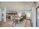 Well-lit dining area with seating for eight, conveniently located next to the breakfast bar and kitchen at 4609 E Ironhorse Rd, Gilbert, AZ 85297