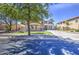This inviting two-story home boasts a spacious driveway, manicured lawn, and lush trees at 4609 E Ironhorse Rd, Gilbert, AZ 85297