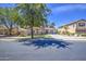 This two-story home boasts a spacious driveway, manicured lawn, and charming curb appeal at 4609 E Ironhorse Rd, Gilbert, AZ 85297