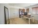 Cozy home office with a large desk, shelving, and great natural light at 4609 E Ironhorse Rd, Gilbert, AZ 85297