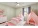 Charming bedroom with teepees, plush rug, and a soft pastel color scheme at 4939 E Paradise Dr, Scottsdale, AZ 85254