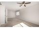 Spacious neutral bedroom with carpet and ceiling fan at 4939 E Paradise Dr, Scottsdale, AZ 85254