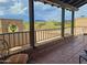 A covered balcony provides desert mountain views and relaxing outdoor seating space at 5141 E Rancho Tierra Dr, Cave Creek, AZ 85331