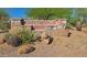 Stone sign for Desert Foothills North community, showcasing desert landscaping at 5141 E Rancho Tierra Dr, Cave Creek, AZ 85331