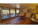 Dining area showcasing tile flooring and access to outdoor patio and mountain views at 5141 E Rancho Tierra Dr, Cave Creek, AZ 85331