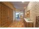 Grand foyer with terra cotta tile, custom woodwork, and natural light at 5141 E Rancho Tierra Dr, Cave Creek, AZ 85331
