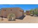Detached garages on a desert lot with blue skies above at 5141 E Rancho Tierra Dr, Cave Creek, AZ 85331