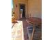 Outdoor patio with tile flooring, table with seating, and lush desert views at 5141 E Rancho Tierra Dr, Cave Creek, AZ 85331