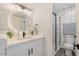 Stylish bathroom featuring updated fixtures and a modern design with a circular mirror at 623 W Guadalupe Rd # 288, Mesa, AZ 85210