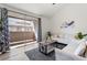 Bright living room with sliding glass doors leading to an outdoor balcony at 623 W Guadalupe Rd # 288, Mesa, AZ 85210