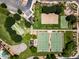 Aerial top-down view of community sports facilities, including tennis, basketball, and volleyball courts at 683 W Honey Locust Ave, Queen Creek, AZ 85140
