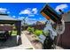Backyard Telescope! Backyard featuring a pergola with dining set and a large, expensive telescope for astronomy enthusiasts at 683 W Honey Locust Ave, Queen Creek, AZ 85140