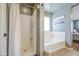 Bright bathroom with shower and bathtub at 935 S Deerfield Ln, Gilbert, AZ 85296