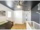 Bedroom with black ceiling and changing table at 935 S Deerfield Ln, Gilbert, AZ 85296