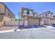 Home featuring a two-car garage at 935 S Deerfield Ln, Gilbert, AZ 85296
