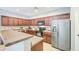 Modern kitchen with stainless steel appliances and ample cabinet space at 935 S Deerfield Ln, Gilbert, AZ 85296