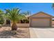 Charming single-story home featuring desert landscaping and an attached two-car garage at 9857 W Tonto Ln, Peoria, AZ 85382
