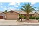 Charming single-story home showcasing desert landscaping and a neutral color palette at 10341 E Dragoon Ave, Mesa, AZ 85208