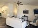 Cozy living room featuring vaulted ceilings and a ceiling fan at 10341 E Dragoon Ave, Mesa, AZ 85208
