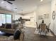 Open-concept floorplan with cozy living room with kitchen island at 10341 E Dragoon Ave, Mesa, AZ 85208
