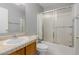 Bright bathroom with a shower/tub combo and vanity with sink at 125 S 56Th St # 124, Mesa, AZ 85206