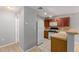 View of the kitchen featuring standard appliances and tile countertops at 125 S 56Th St # 124, Mesa, AZ 85206