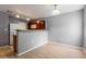 Kitchen area with dark cabinetry and open space at 125 S 56Th St # 124, Mesa, AZ 85206