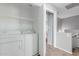 Laundry area with washer and dryer hookups, convenient shelving, and easy access at 125 S 56Th St # 124, Mesa, AZ 85206
