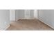 Comfortable main bedroom with carpet and a doorway view to the bathroom at 125 S 56Th St # 124, Mesa, AZ 85206