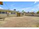 View of the home's backyard and covered patio at 1719 E Dana Ave, Mesa, AZ 85204