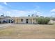 Charming single-story home with a covered front porch and a well-maintained yard in a quiet neighborhood at 1719 E Dana Ave, Mesa, AZ 85204