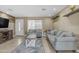 Cozy living room featuring comfortable seating, stylish decor, and plenty of natural light at 1719 E Dana Ave, Mesa, AZ 85204