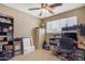 Functional office space featuring a desk, shelving, and ample storage at 1719 E Dana Ave, Mesa, AZ 85204