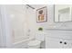 Bathroom features a shower/tub combo and vanity with white cabinets at 17827 N 51St Way, Scottsdale, AZ 85254