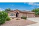 Charming single-story home with well-maintained front yard and three-car garage at 17827 N 51St Way, Scottsdale, AZ 85254
