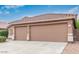 Three-car garage with plenty of space for vehicles and storage at 17827 N 51St Way, Scottsdale, AZ 85254
