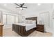 Relaxing bedroom with a comfortable king-sized bed, neutral tones, and ample natural light at 17827 N 51St Way, Scottsdale, AZ 85254