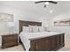 Calm bedroom featuring a large bed, two nightstands and natural light streaming in from the windows at 17827 N 51St Way, Scottsdale, AZ 85254