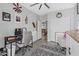 Comfortable bedroom with a ceiling fan, closet, and a view of the backyard at 17935 W Louise Dr, Surprise, AZ 85387
