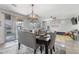 Bright dining area offering easy access to the outdoor patio at 17935 W Louise Dr, Surprise, AZ 85387