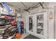 Functional garage area with easy access to the house and storage solutions at 17935 W Louise Dr, Surprise, AZ 85387