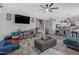 Open-concept layout seamlessly connects the living room and dining area for easy living and entertaining at 17935 W Louise Dr, Surprise, AZ 85387