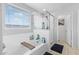 Bright bathroom featuring a bathtub and a shower at 17935 W Louise Dr, Surprise, AZ 85387